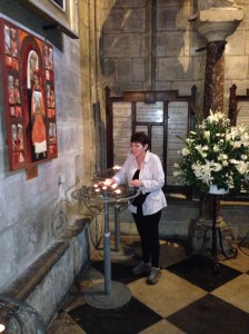 The lighting of the first of many, many candles